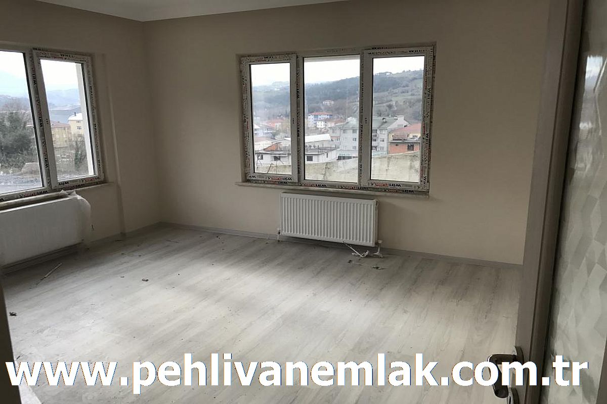 PEHLİVAN EMLAKTAN ALAPLI MERKEZ MAHALLESİNDE SATILIK YENİ DAİRE